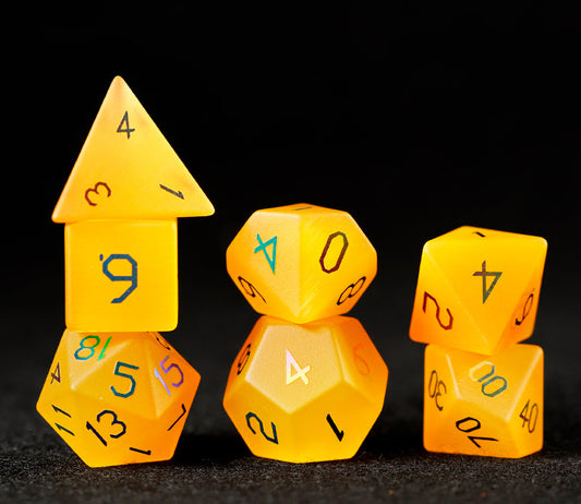 Ensemble de 7 dés polyédriques plaqués œil de chat doré