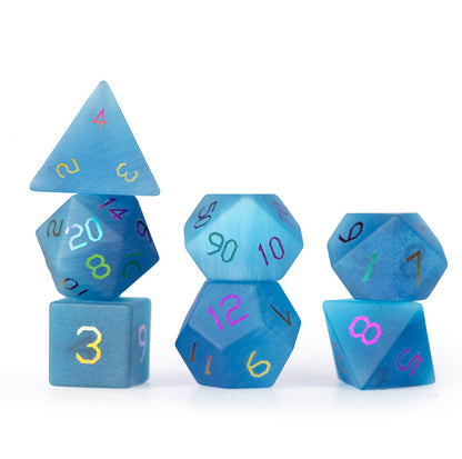 Ensemble de 7 dés polyédriques bleu océan à motif œil-de-chat 