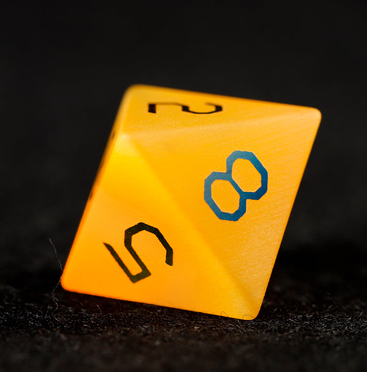 Ensemble de 7 dés polyédriques plaqués œil de chat doré 