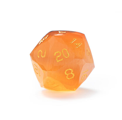 Ensemble de 7 dés en cristal œil-de-chat ambré taillés en diamant 