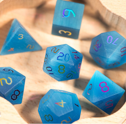Ensemble de 7 dés polyédriques bleu océan à motif œil-de-chat 