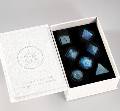 Ensemble de 7 dés polyédriques bleu océan à motif œil-de-chat 