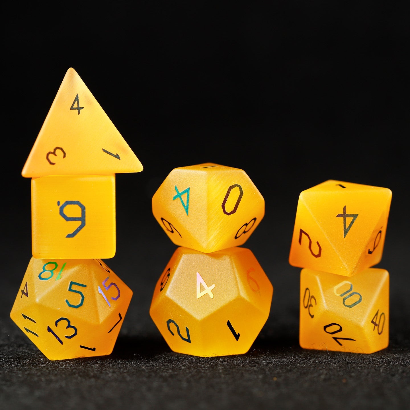 Ensemble de 7 dés polyédriques plaqués œil de chat doré 