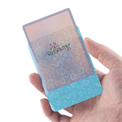 Love Heart-Shape Laser Flashing Rounded Card Sleeves – Blue card sleeve held in hand