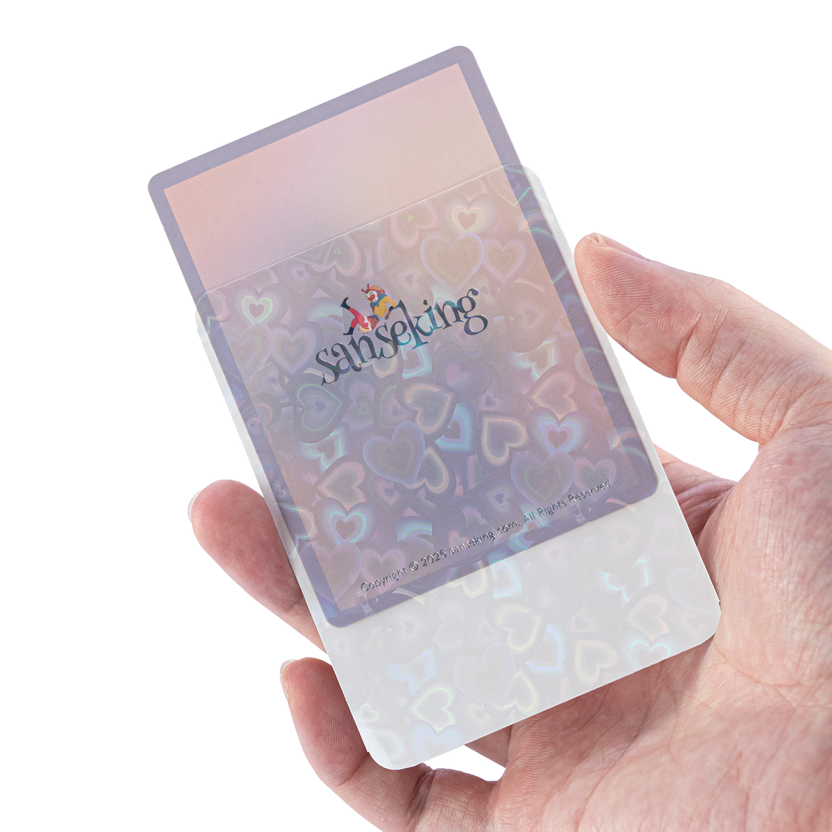 Love Heart-Shape Laser Flashing Rounded Card Sleeves – White card sleeve held in hand