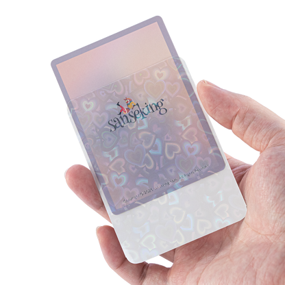 Love Heart-Shape Laser Flashing Rounded Card Sleeves – White card sleeve held in hand