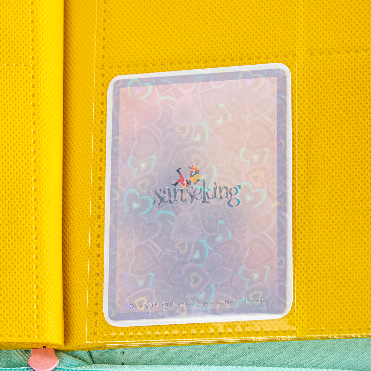 Love Heart-Shape Laser Flashing Rounded Card Sleeves – White card sleeve stored in a binder page