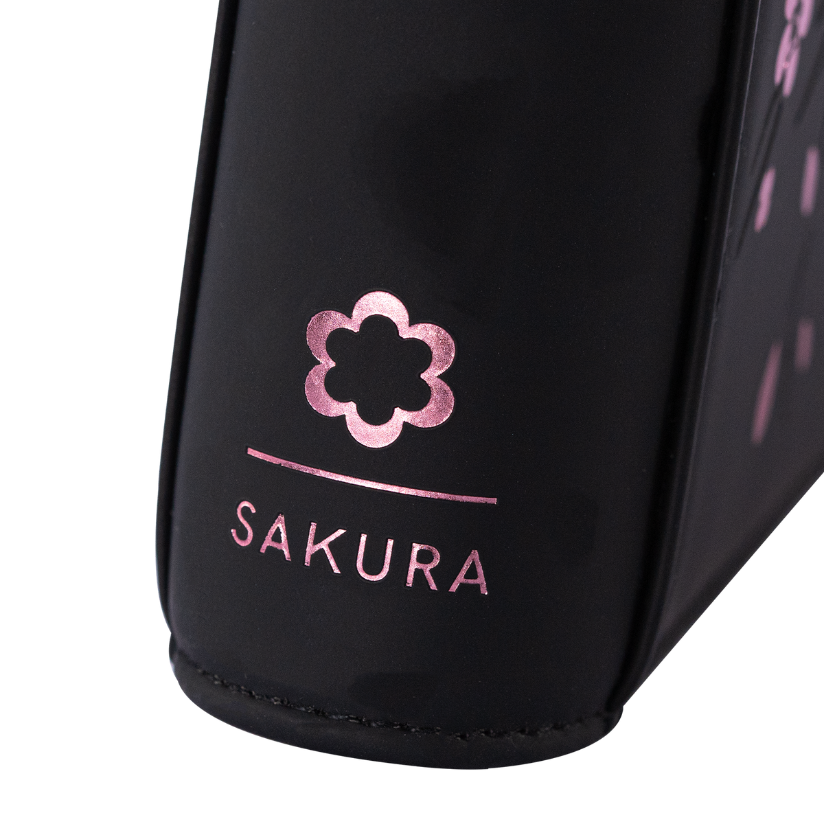 Angled view of the SAKURA emblem on the Black card binder