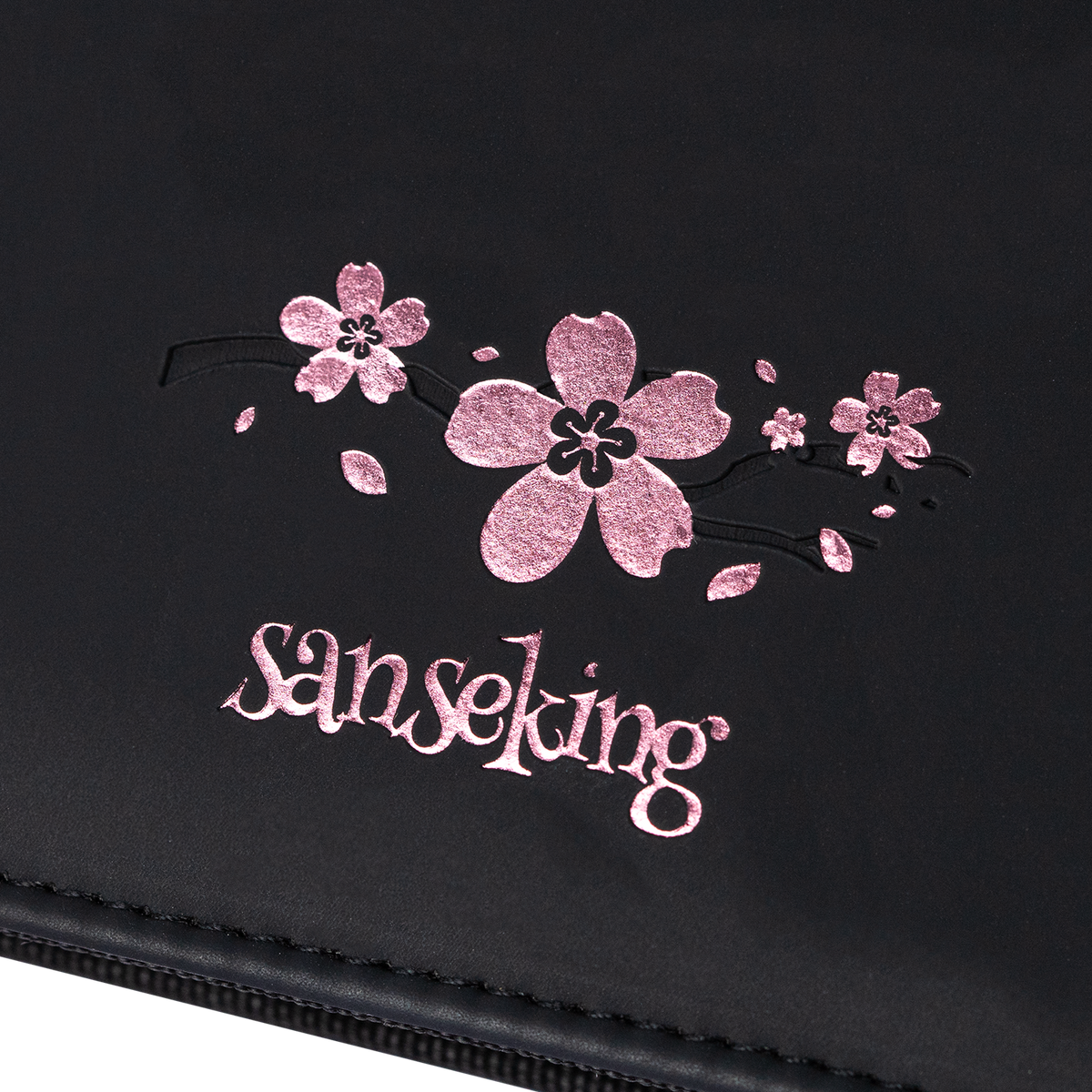 Cherry blossom Sanseking logo detail on the Black SAKURA card binder