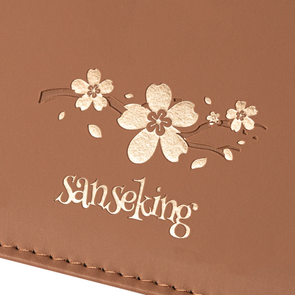 Cherry blossom Sanseking logo detail on the Brown SAKURA card binder