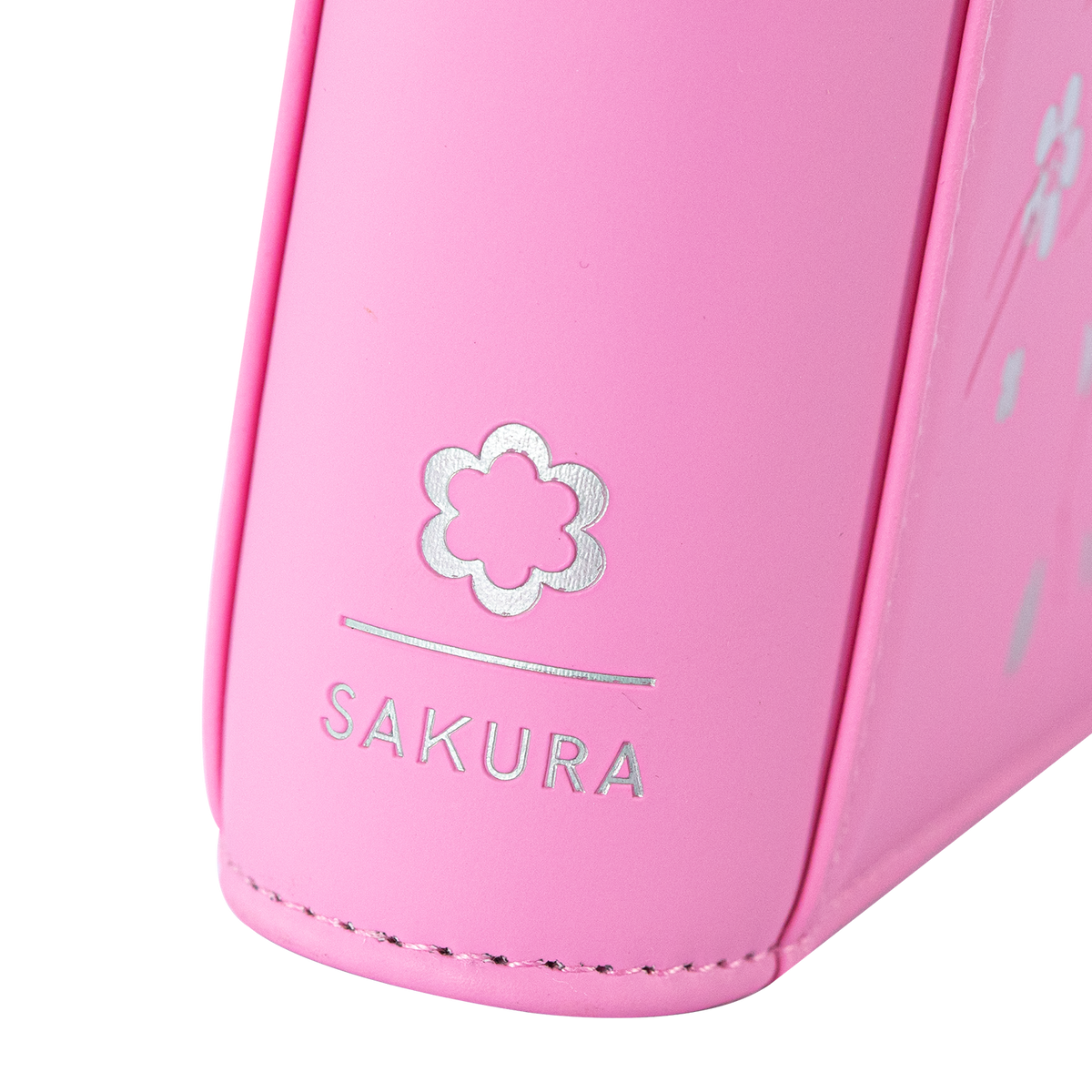 Angled view of the SAKURA emblem on the Pink card binder