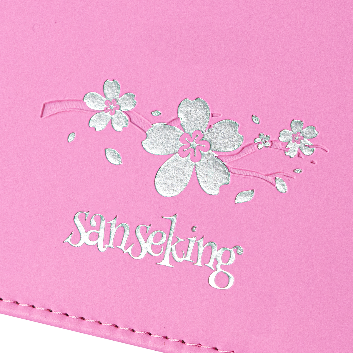 Cherry blossom Sanseking logo detail on the Pink SAKURA card binder