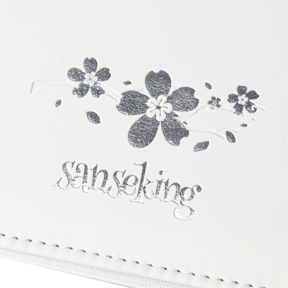 Cherry blossom Sanseking logo detail on the White SAKURA card binder