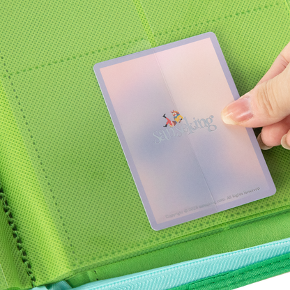 Sanseking AXIS-SK Light Green 12-pocket trading card binder card being loaded into a pocket