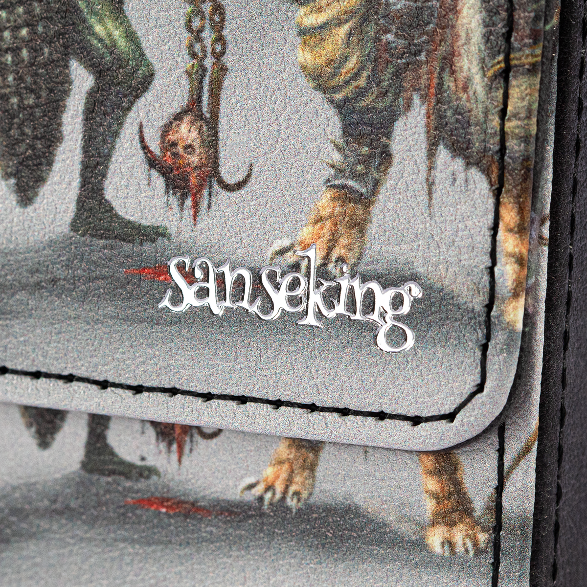 Sanseking logo and stitching on the Hellbringer deck box