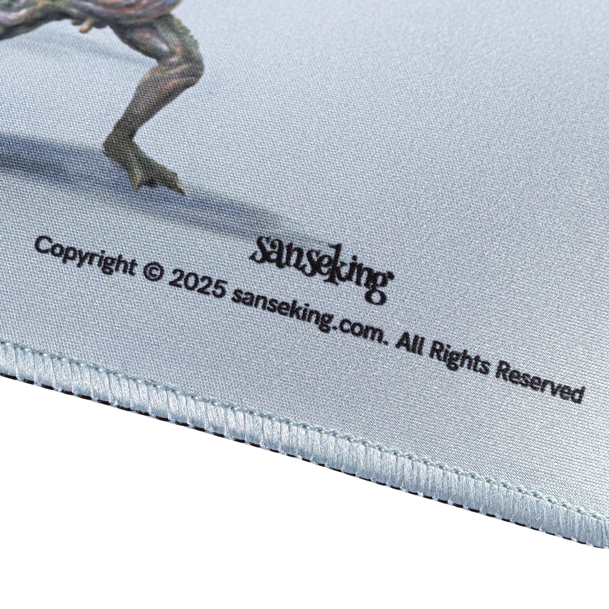 Sanseking branding and edge stitching on the Hellbringer playmat