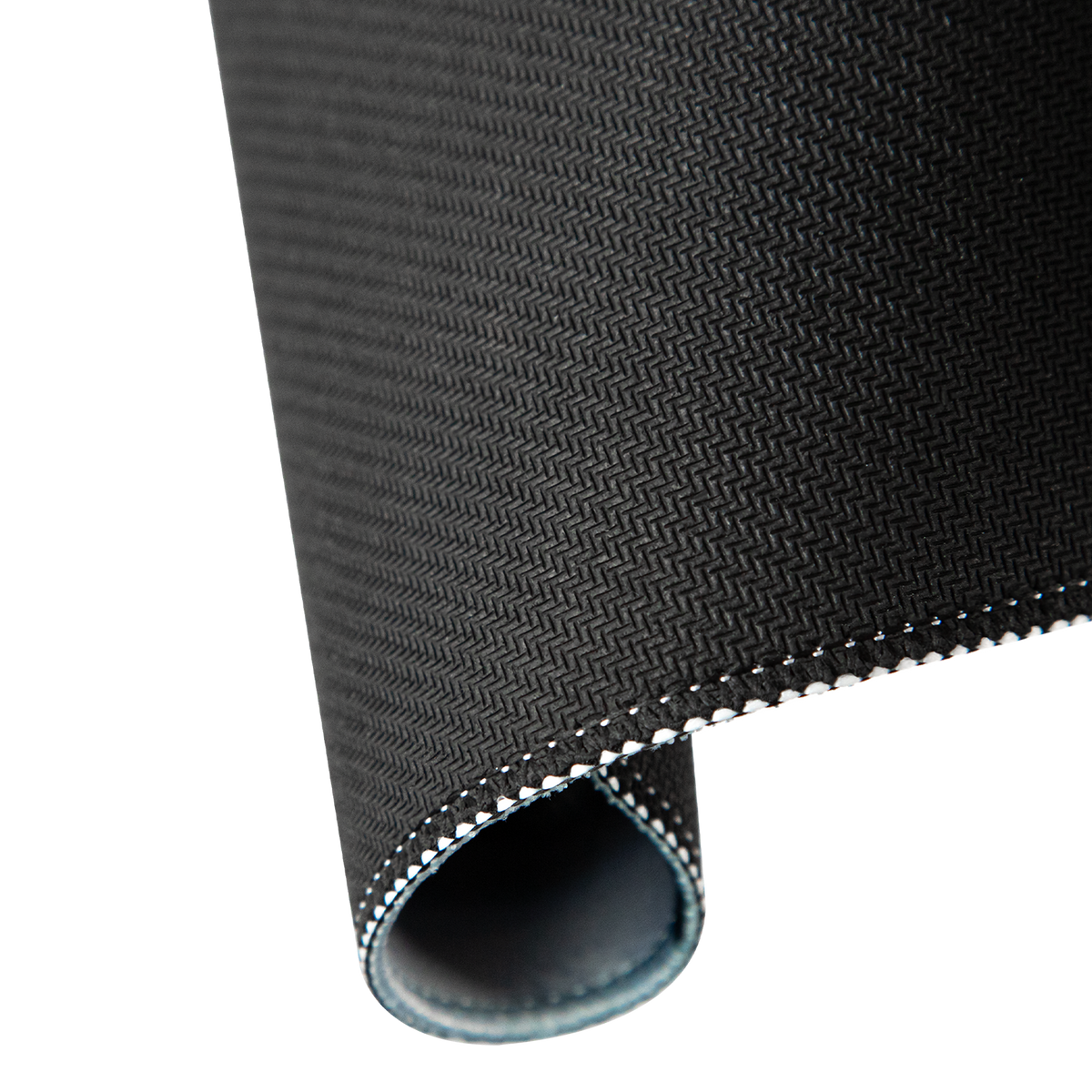 Textured rubber backing and stitched edge of the Hellbringer playmat