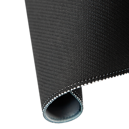 Textured rubber backing and stitched edge of the Hellbringer playmat