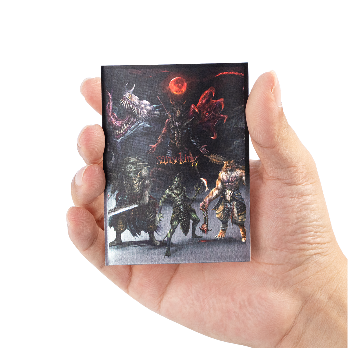 Hellbringer card sleeves held in one hand