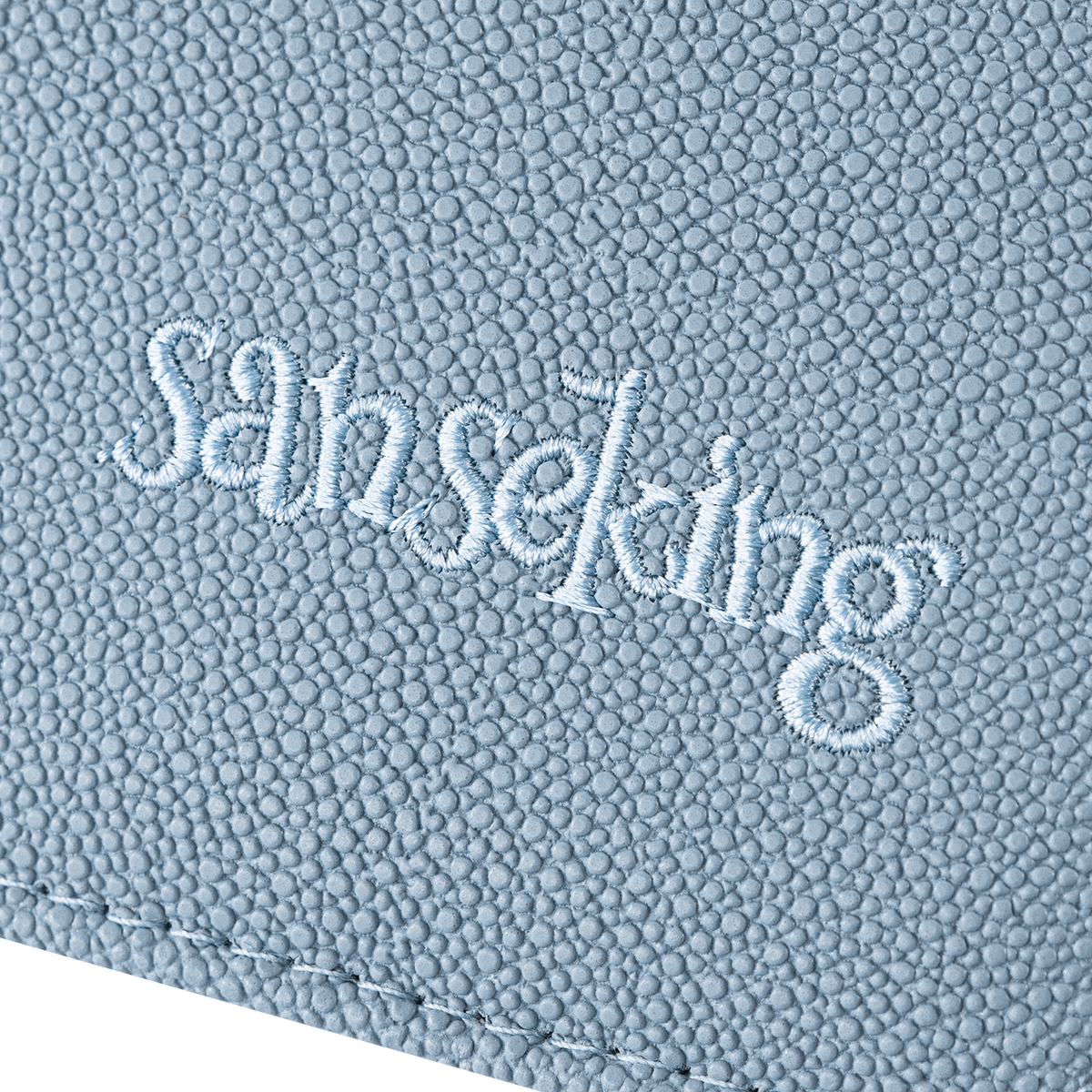 Sanseking PORT Blue 4-pocket toploader binder embroidered Sanseking logo detail