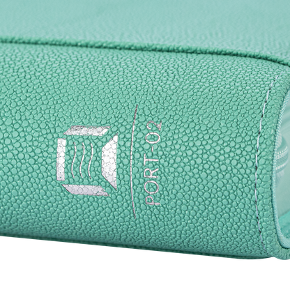 Sanseking PORT Green 4-pocket toploader binder close-up of the silver model marking