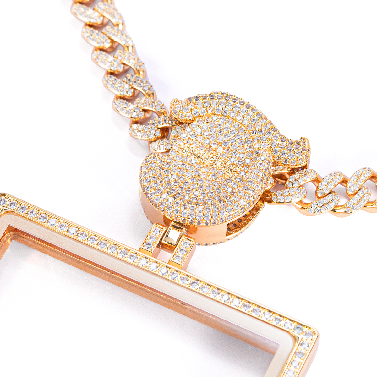 Close-up of gold-plated frame and zircon stone accents on Radiance pendant case