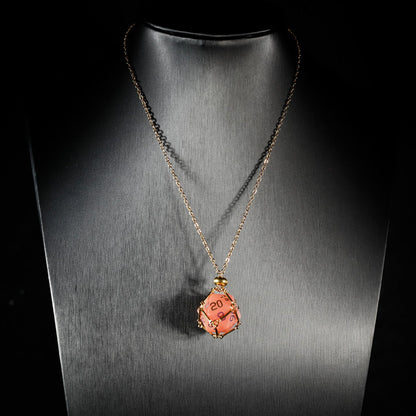Ensemble de 7 dés polyédriques en verre rouge pastèque 