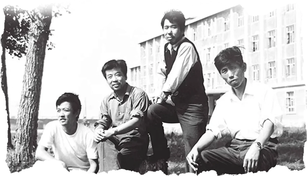 The four-person creative team photographed in 1983